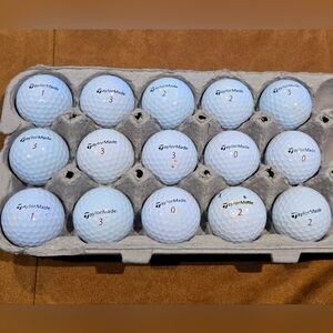 15 Taylormade Tour Response white golf balls. very good to excellent condition.